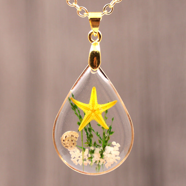 Collana in oro con resina epossidica fai da te con stelle marine naturali