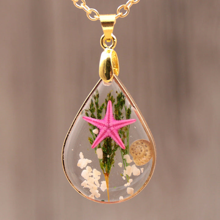 Collana in oro con resina epossidica fai da te con stelle marine naturali