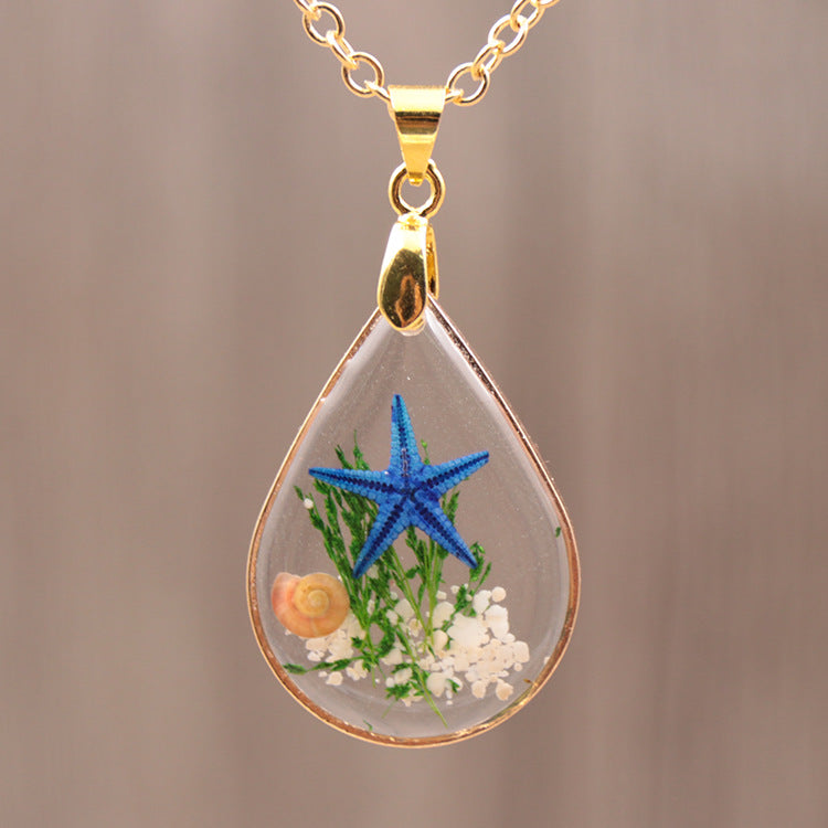 Collana in oro con resina epossidica fai da te con stelle marine naturali