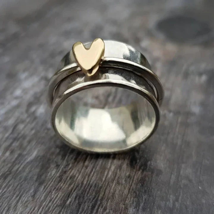 Anello d'argento vintage con cuore pendente