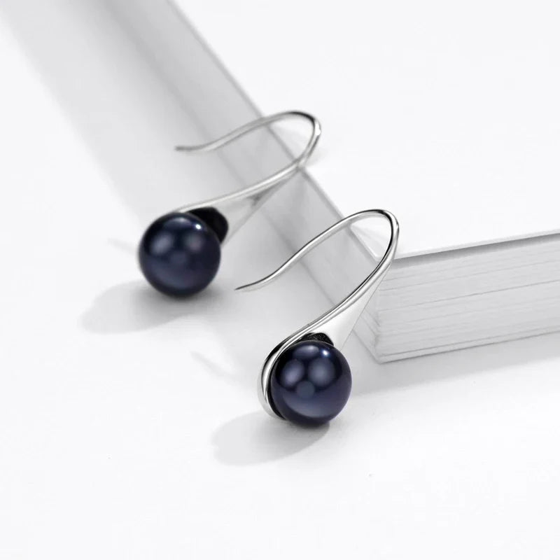 Orecchini pendenti classici con perle