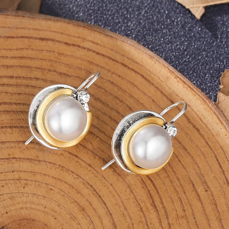 Orecchini in acciaio con perla
