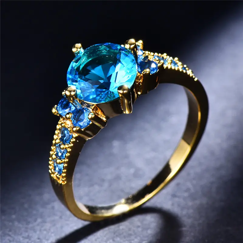Anello d'oro con zirconia azzurra