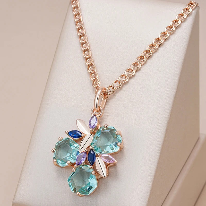 Collana con ciondolo a fiore tropicale con zircone acquamarina e zaffiro, ametista e quarzo rosa placcato in oro rosa 18 carati
