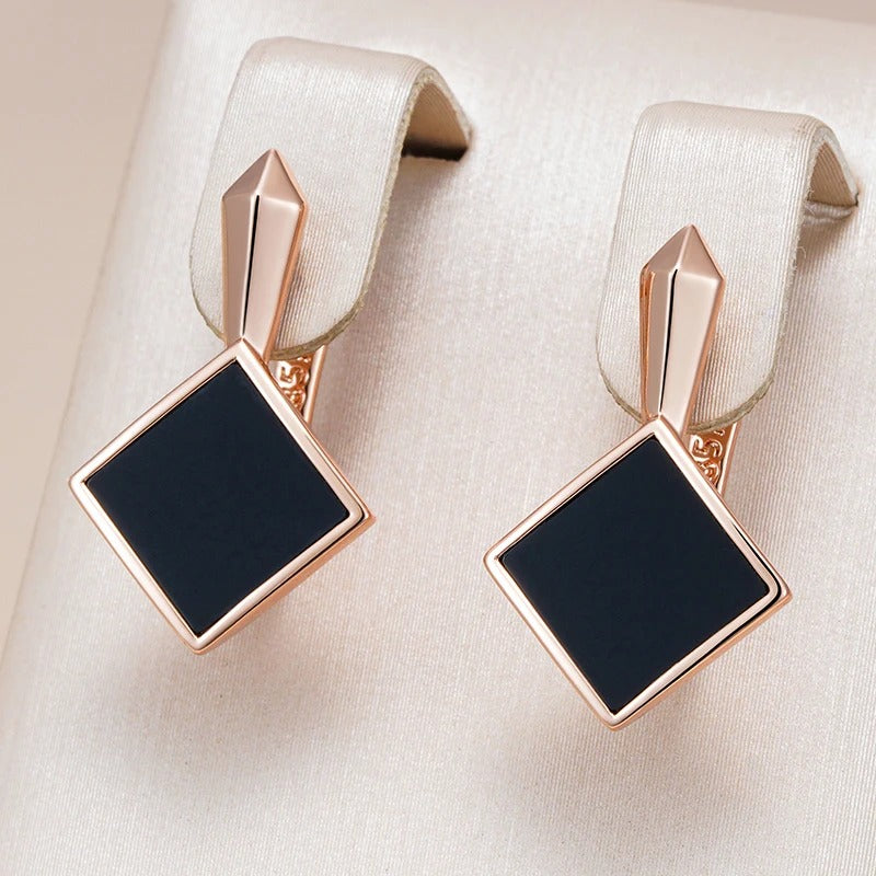 Orecchini pendenti eleganti placcati in oro rosa 18 carati con pietre nere quadrate
