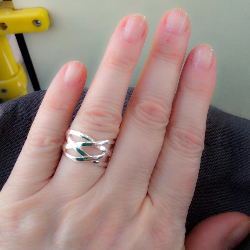 Anello intrecciato in argento 925