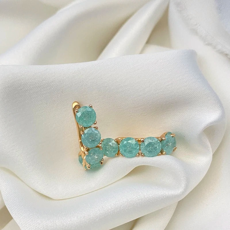 Créoles riempite di zirconi di acquamarina placcate in oro rosa 18K