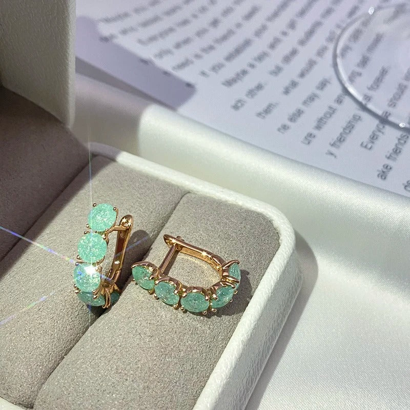 Créoles riempite di zirconi di acquamarina placcate in oro rosa 18K