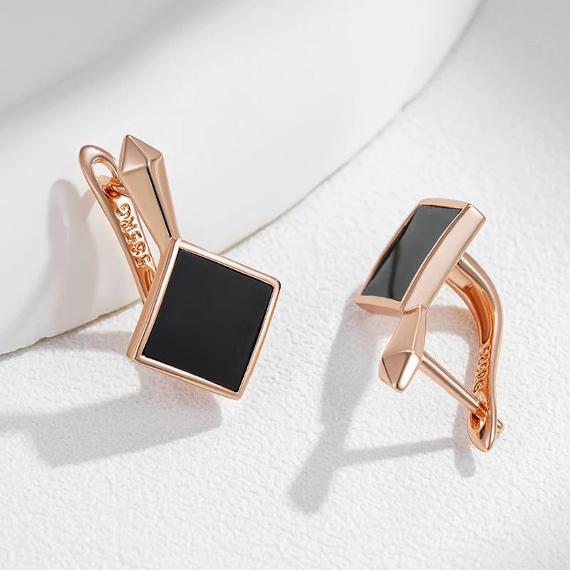 Orecchini pendenti eleganti placcati in oro rosa 18 carati con pietre nere quadrate