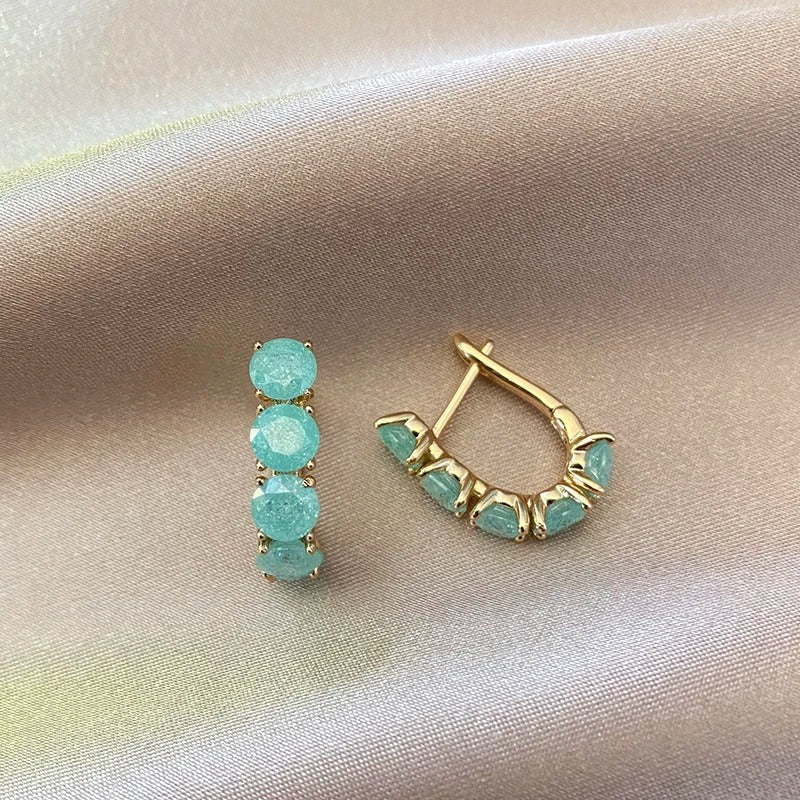 Créoles riempite di zirconi di acquamarina placcate in oro rosa 18K